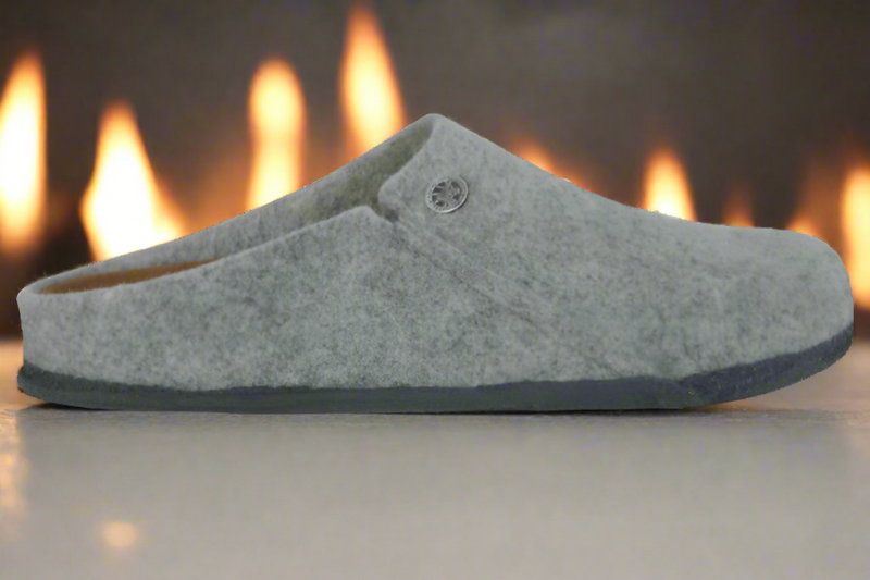 Birkenstock Zermatt Slipper in front of a warm fire