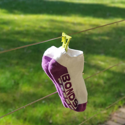 socks hanging on the clothes line