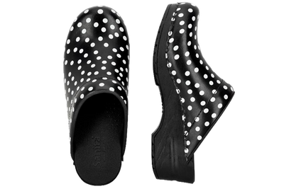 San Flex wellness footwear clogs. Side and top view Black with white dots